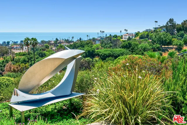 front view of a house with a small yard