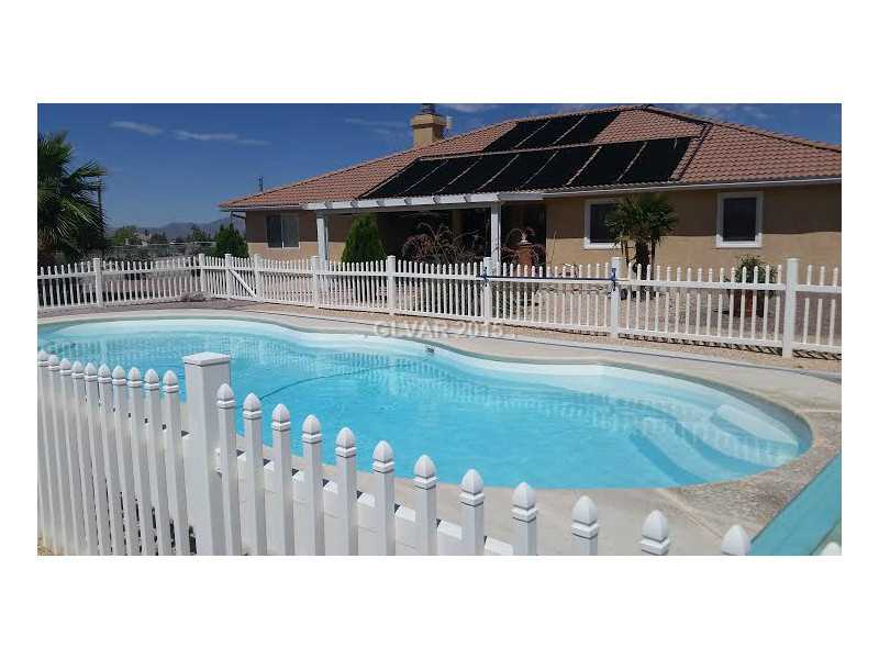 3201 South Rodeo Avenue Pahrump, NV 89048 - Photo 30 of 33 Swimming Pool/Hot Tub/Sauna. Electric cover keeps pool sparkling clean.