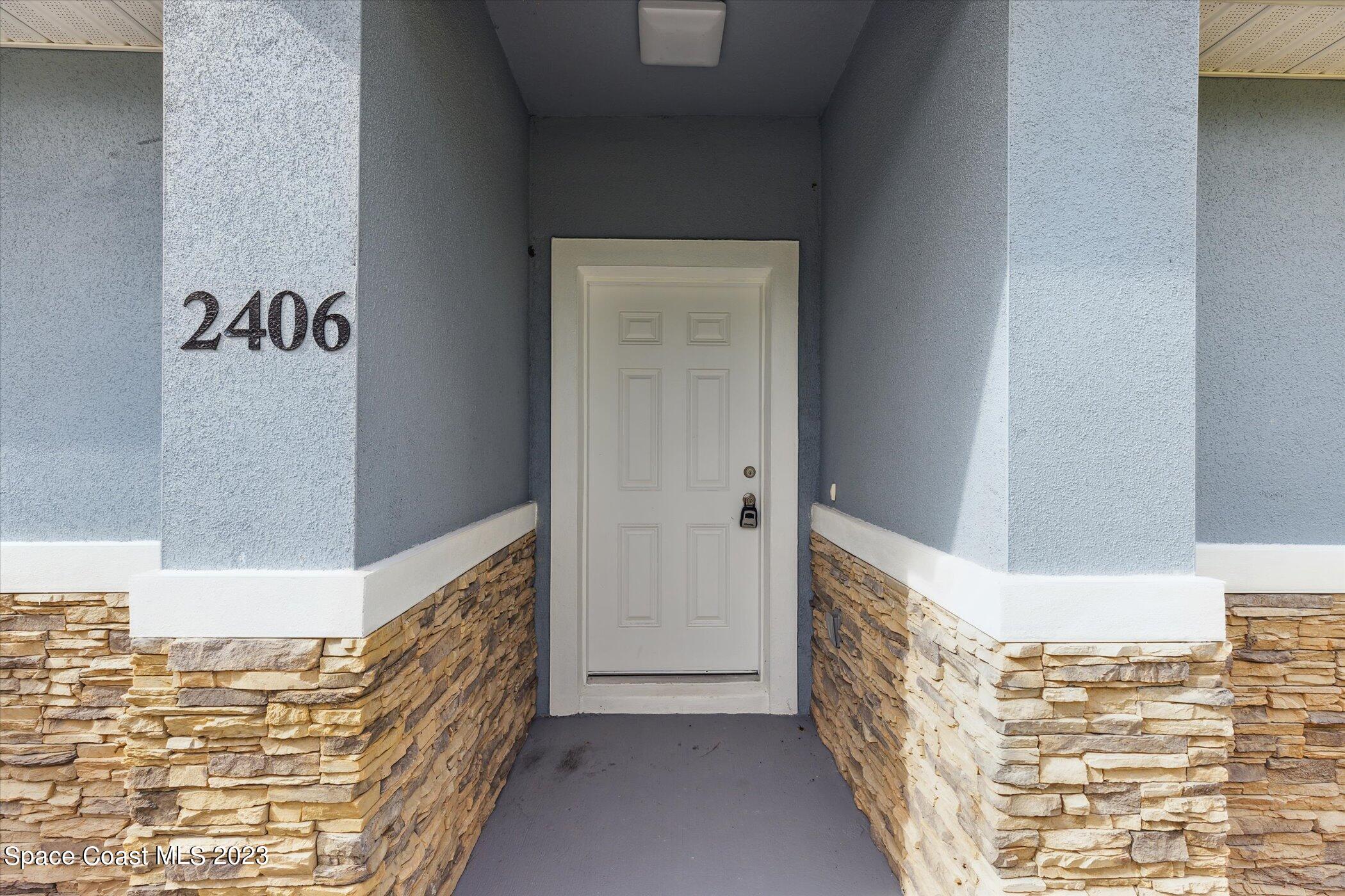 2406 Anchor Road Southeast Palm Bay, FL 32909 - Photo 5 of 37 Front Door Entry