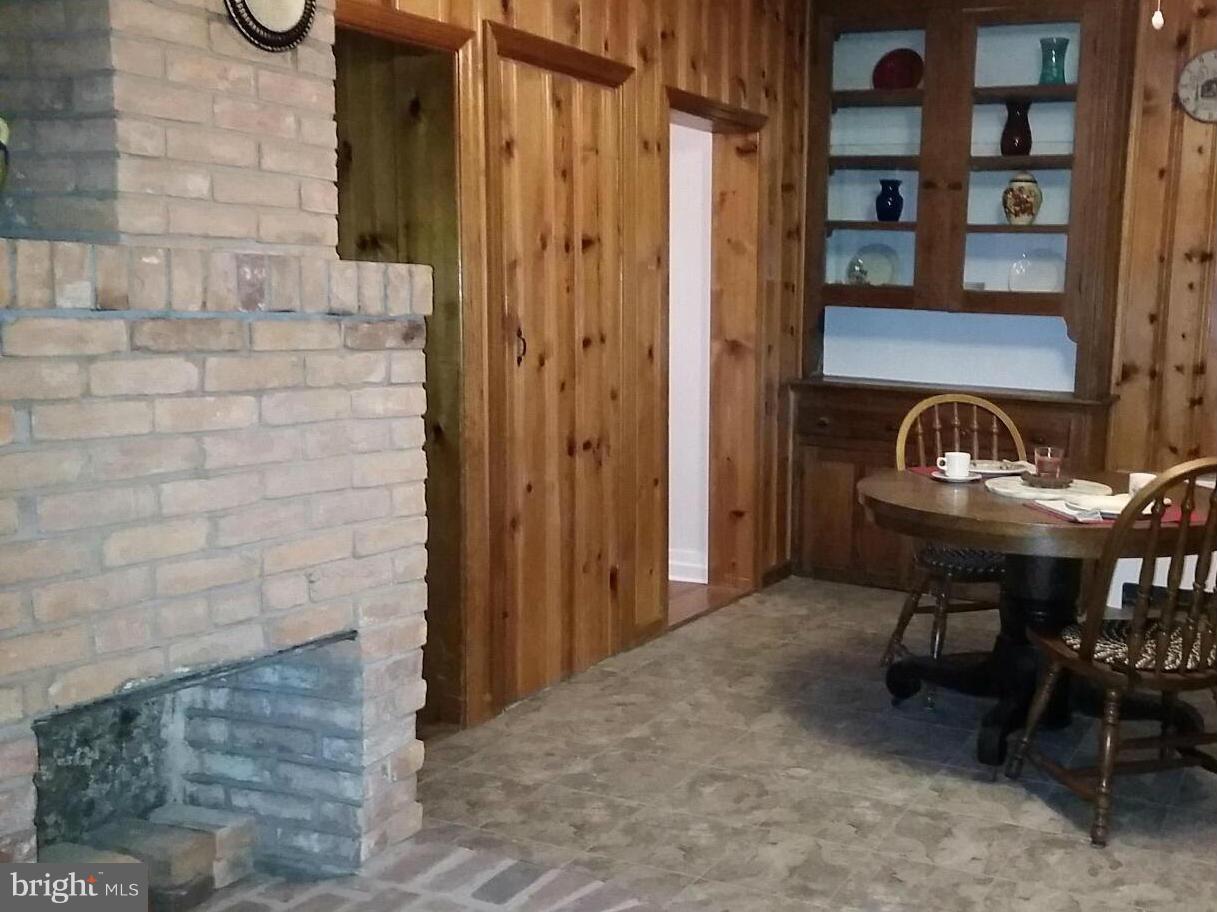 3344 Emory Road North Finksburg, MD 21048 - Photo 18 of 30 a view of a entryway of a house with wooden chairs