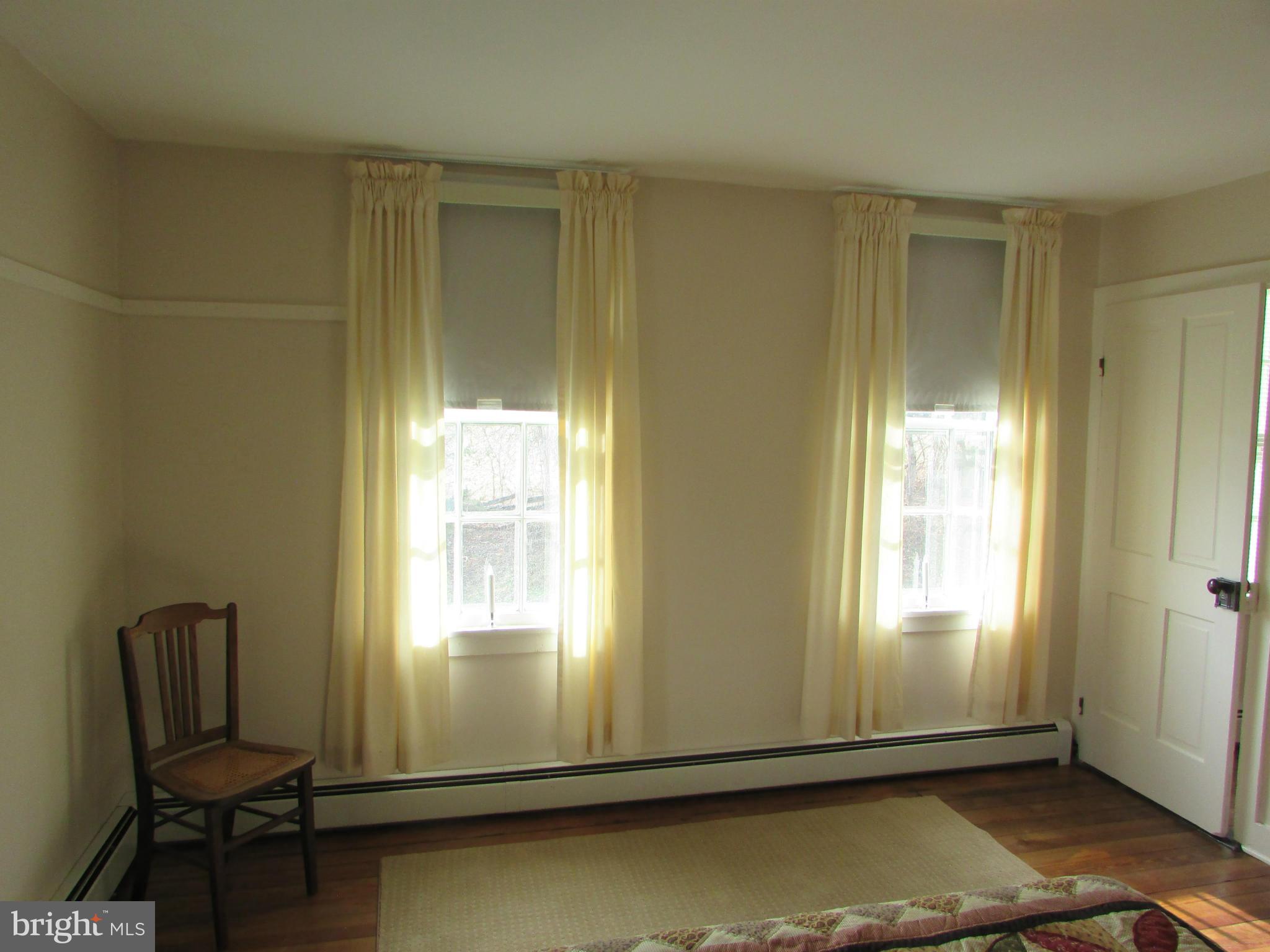 3344 Emory Road North Finksburg, MD 21048 - Photo 21 of 30 a view of a room with wooden floor and windows
