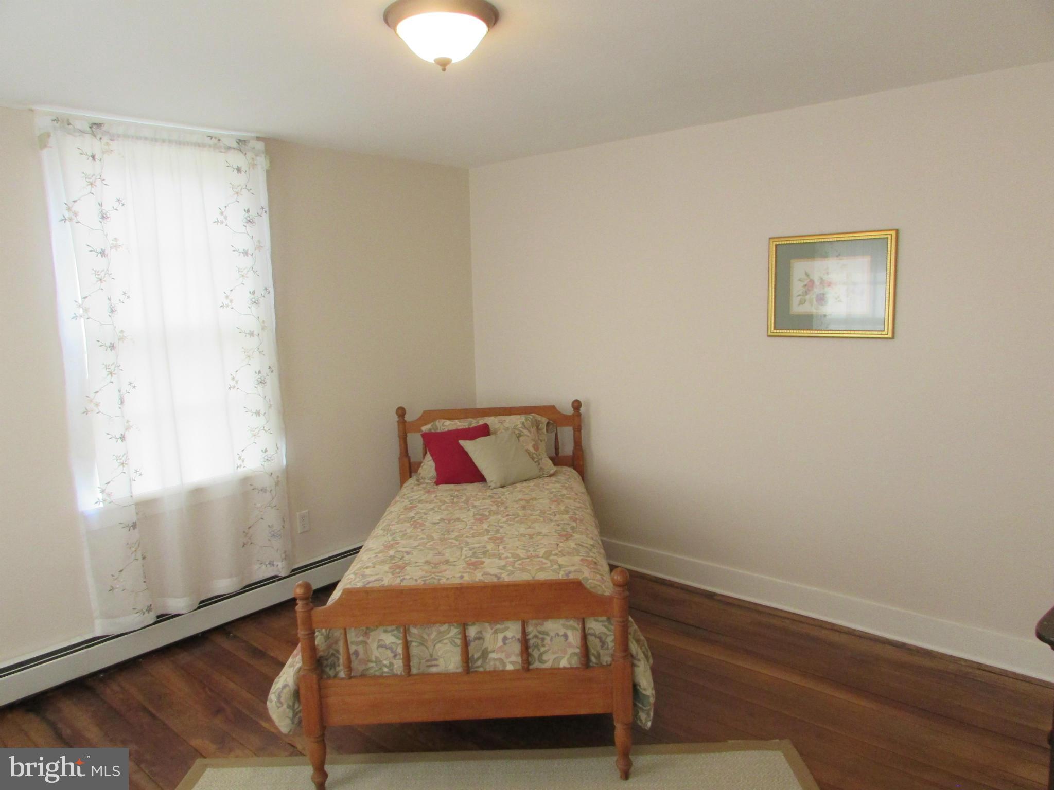 3344 Emory Road North Finksburg, MD 21048 - Photo 22 of 30 a room with a bed and a window