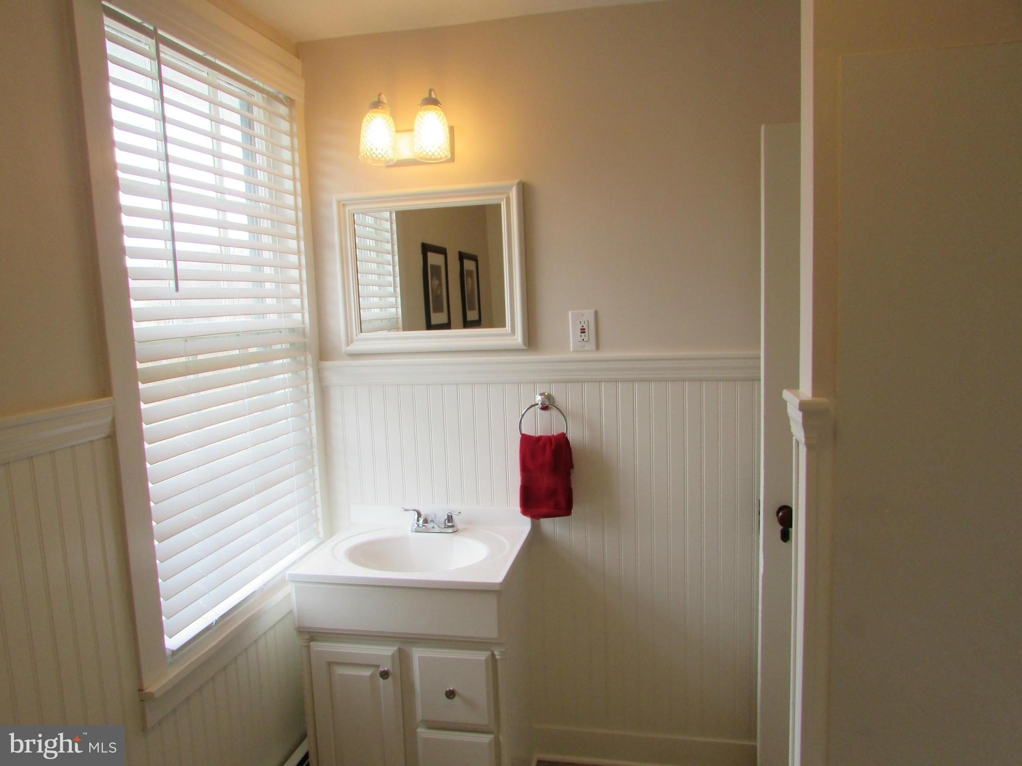 3344 Emory Road North Finksburg, MD 21048 - Photo 24 of 30 a bathroom with a sink and a window