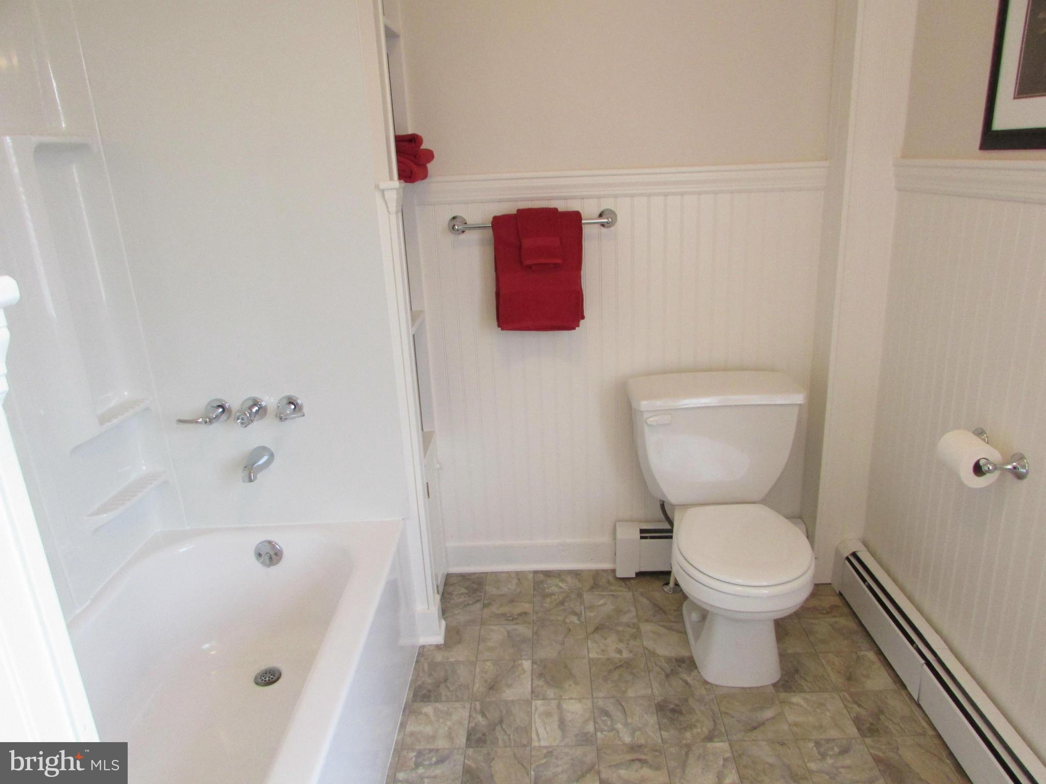 3344 Emory Road North Finksburg, MD 21048 - Photo 25 of 30 a bathroom with a toilet and a bathtub