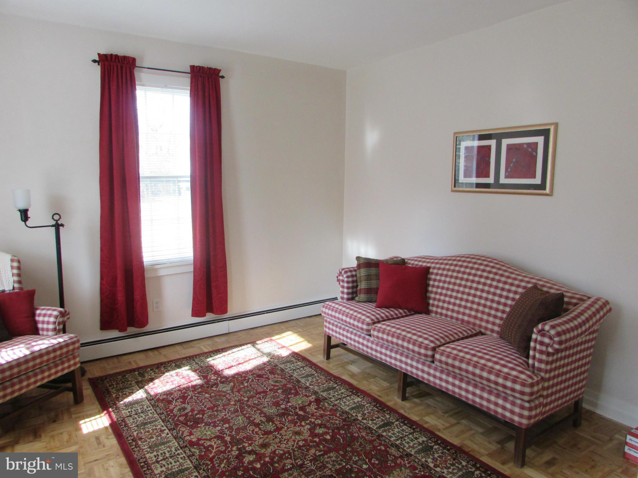 3344 Emory Road North Finksburg, MD 21048 - Photo 10 of 30 a living room with furniture and a rug
