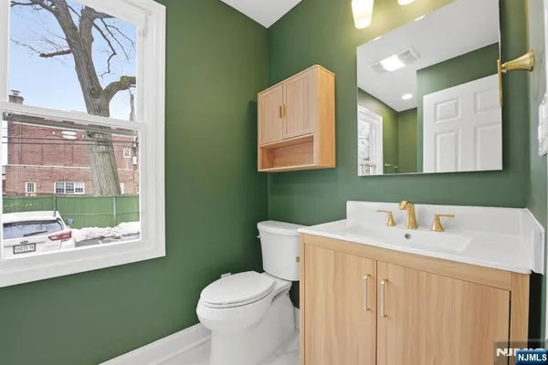 a bathroom with a sink and a toilet