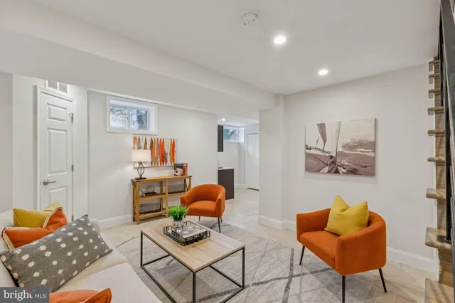 a living room with furniture and a couch