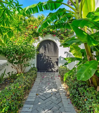 an aerial view of a house with a ocean view