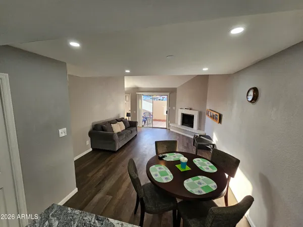 a living room with furniture and a table