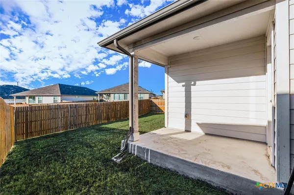 a house view with a garden space