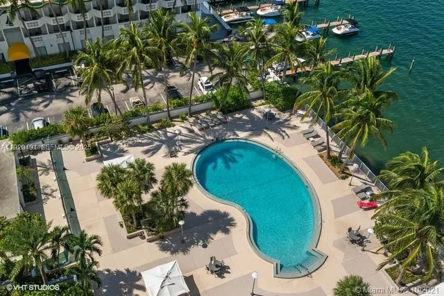 a house with palm tree in front of it