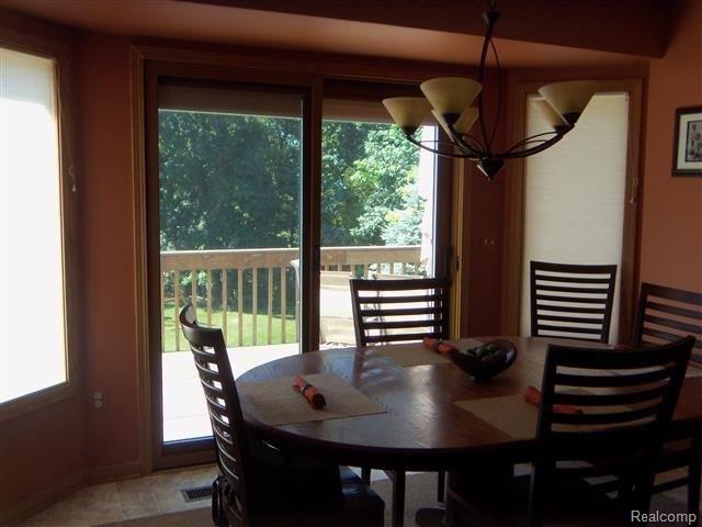 8112 Lee Road Brighton, MI 48116 - Photo 9 of 30 Dining area open to kitchen.JPG
