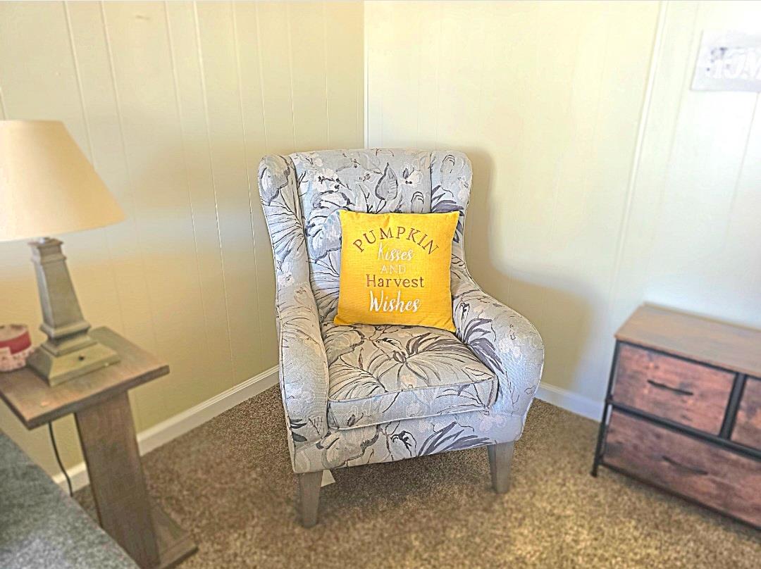 12344-26 Mile Road, Unit 32 Oakdale, CA 95219 - Photo 15 of 22 a bedroom with a bed and a couch