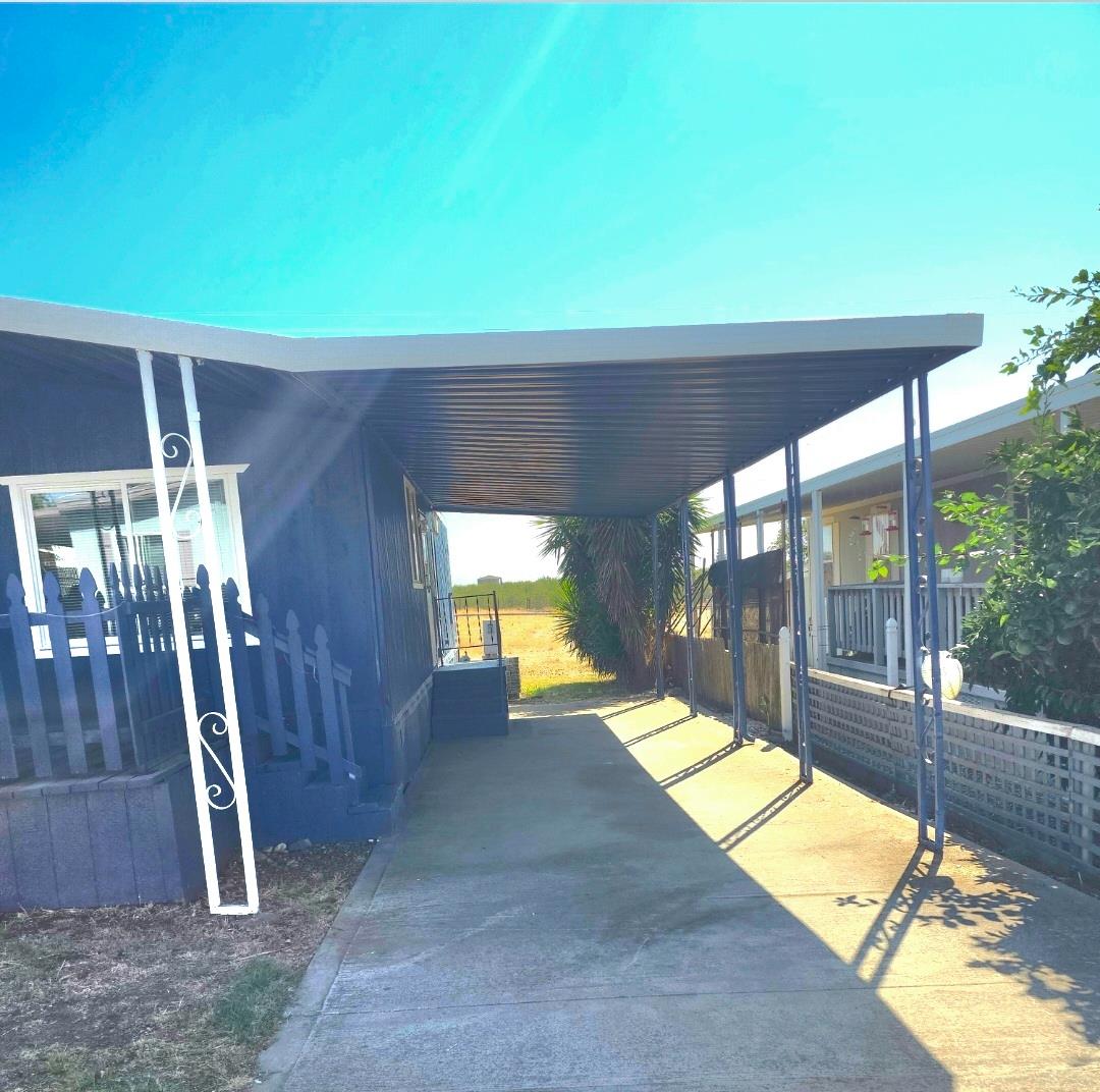 12344-26 Mile Road, Unit 32 Oakdale, CA 95219 - Photo 2 of 22 a view of swimming pool with seating space