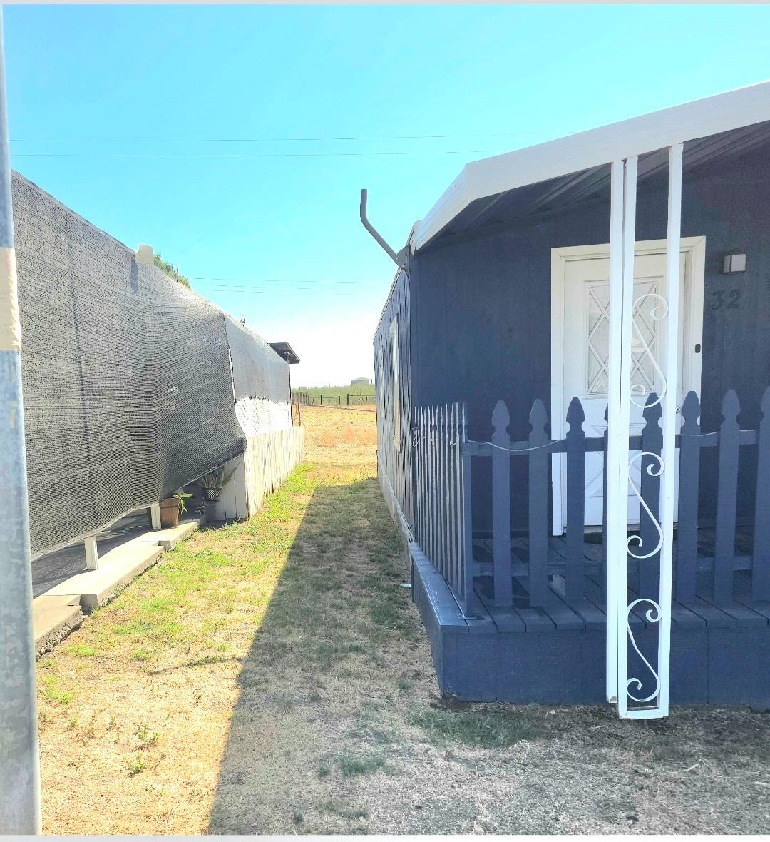 12344-26 Mile Road, Unit 32 Oakdale, CA 95219 - Photo 4 of 22 a view of swimming pool with outdoor seating