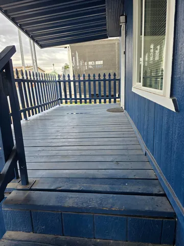 a view of deck and wooden floor