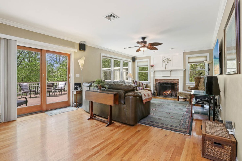 143 Kimball Road Amesbury, MA 01913 - Photo 8 of 30 a living room with furniture and a fireplace