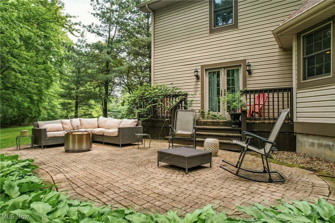 1681 State Road Northwest Warren, OH 44481 - Photo 9 of 50 View of patio featuring outdoor lounge area and french doors