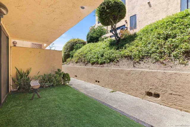 a view of a back yard of the house