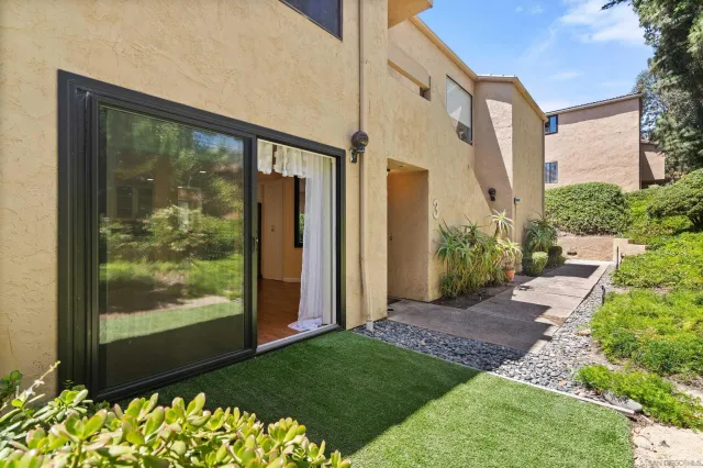 a view of a back yard of the house