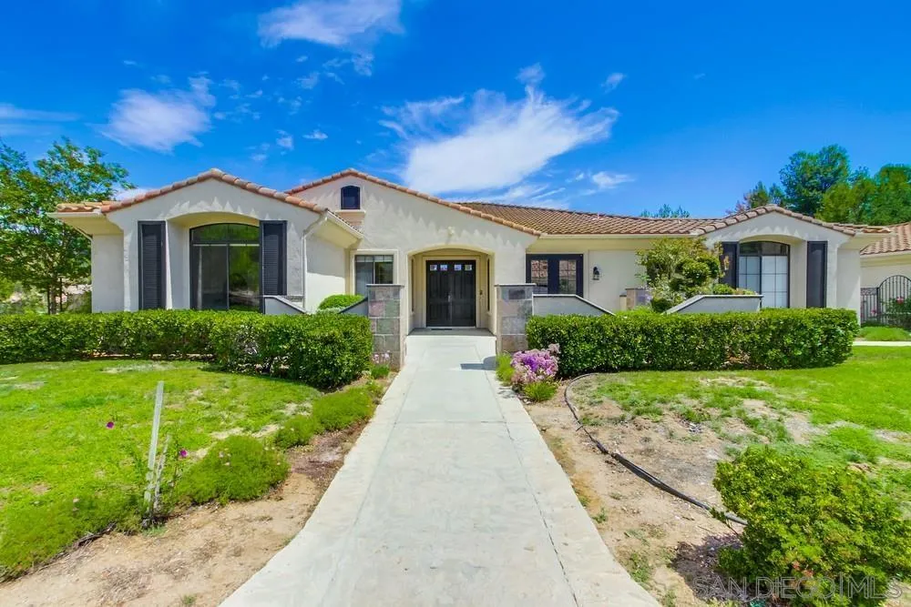 3605-7 Logwood Place Fallbrook, CA 92028 - Photo 1 of 74 a front view of a house with a yard