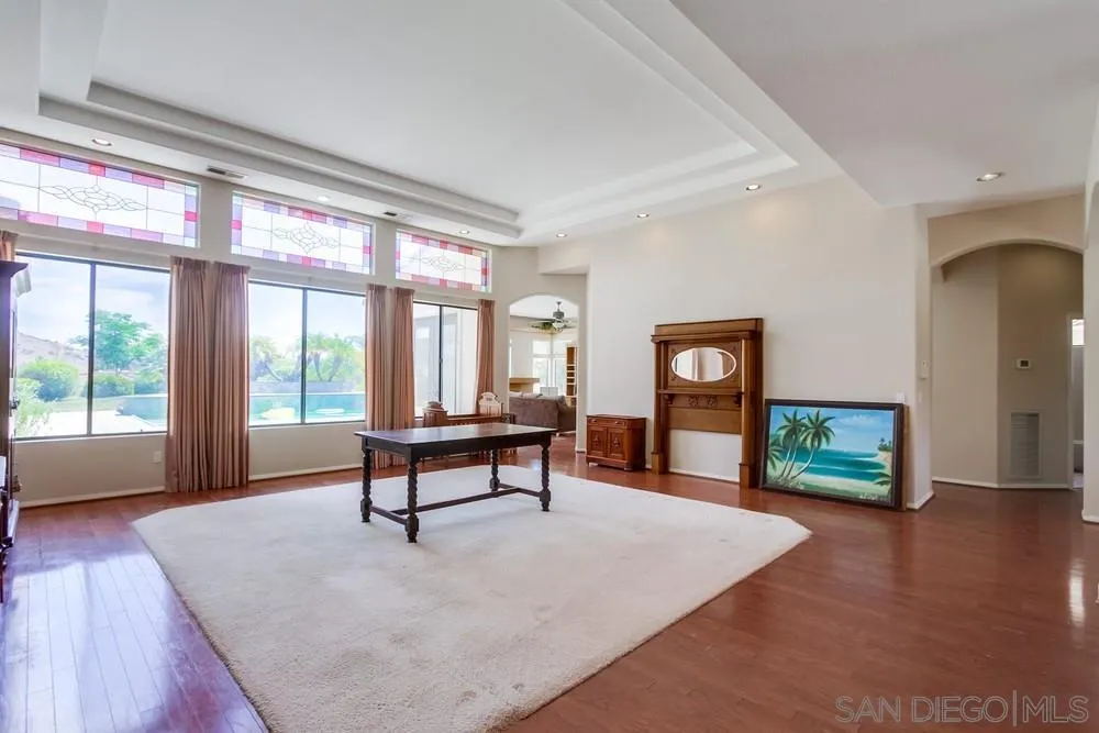 3605-7 Logwood Place Fallbrook, CA 92028 - Photo 15 of 74 a living room with furniture a window and wooden floor