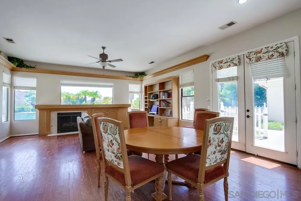 3605-7 Logwood Place Fallbrook, CA 92028 - Photo 40 of 74 a view of a dining room with furniture window and wooden floor