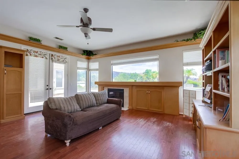 3605-7 Logwood Place Fallbrook, CA 92028 - Photo 42 of 74 a living room with furniture and a large window