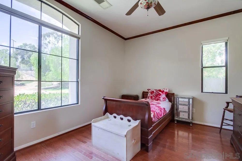 3605-7 Logwood Place Fallbrook, CA 92028 - Photo 58 of 74 a bedroom with a bed and a window