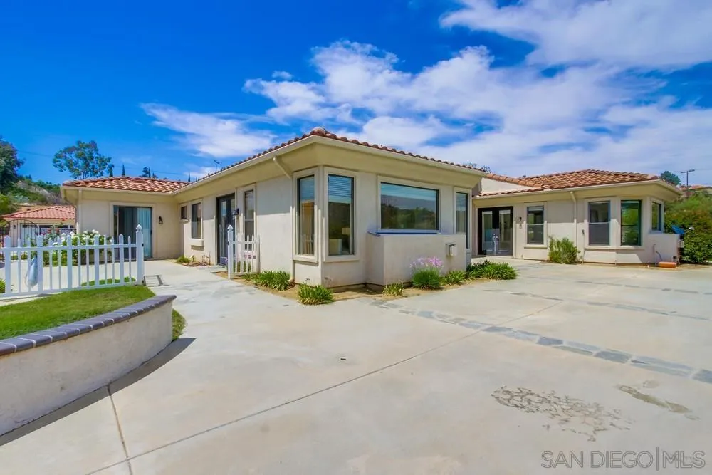 3605-7 Logwood Place Fallbrook, CA 92028 - Photo 64 of 74 a front view of a house with a garden