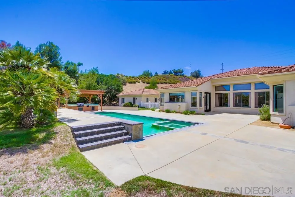 3605-7 Logwood Place Fallbrook, CA 92028 - Photo 71 of 74 a front view of a house with a yard