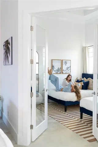 a living room with furniture and a rug