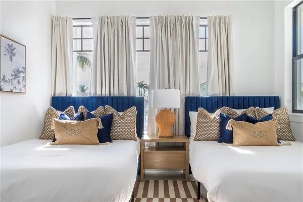 a bed room with a bed and a couch