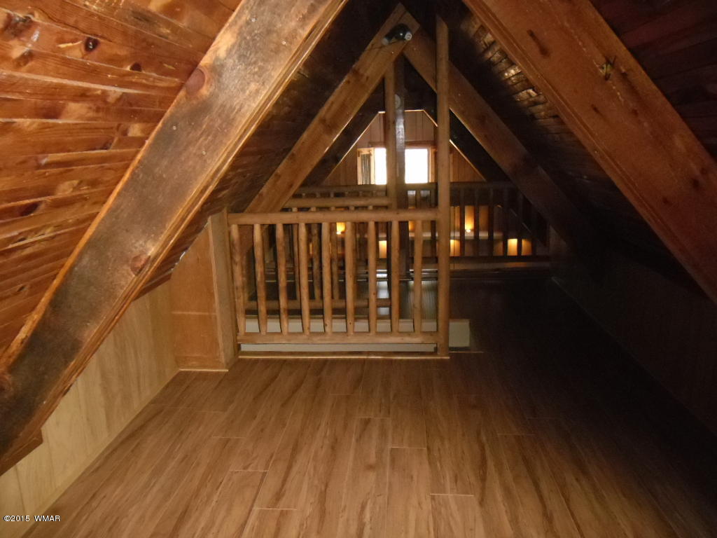3463 Quail Run Road Overgaard, AZ 85933 - Photo 33 of 37 a view of wooden balcony