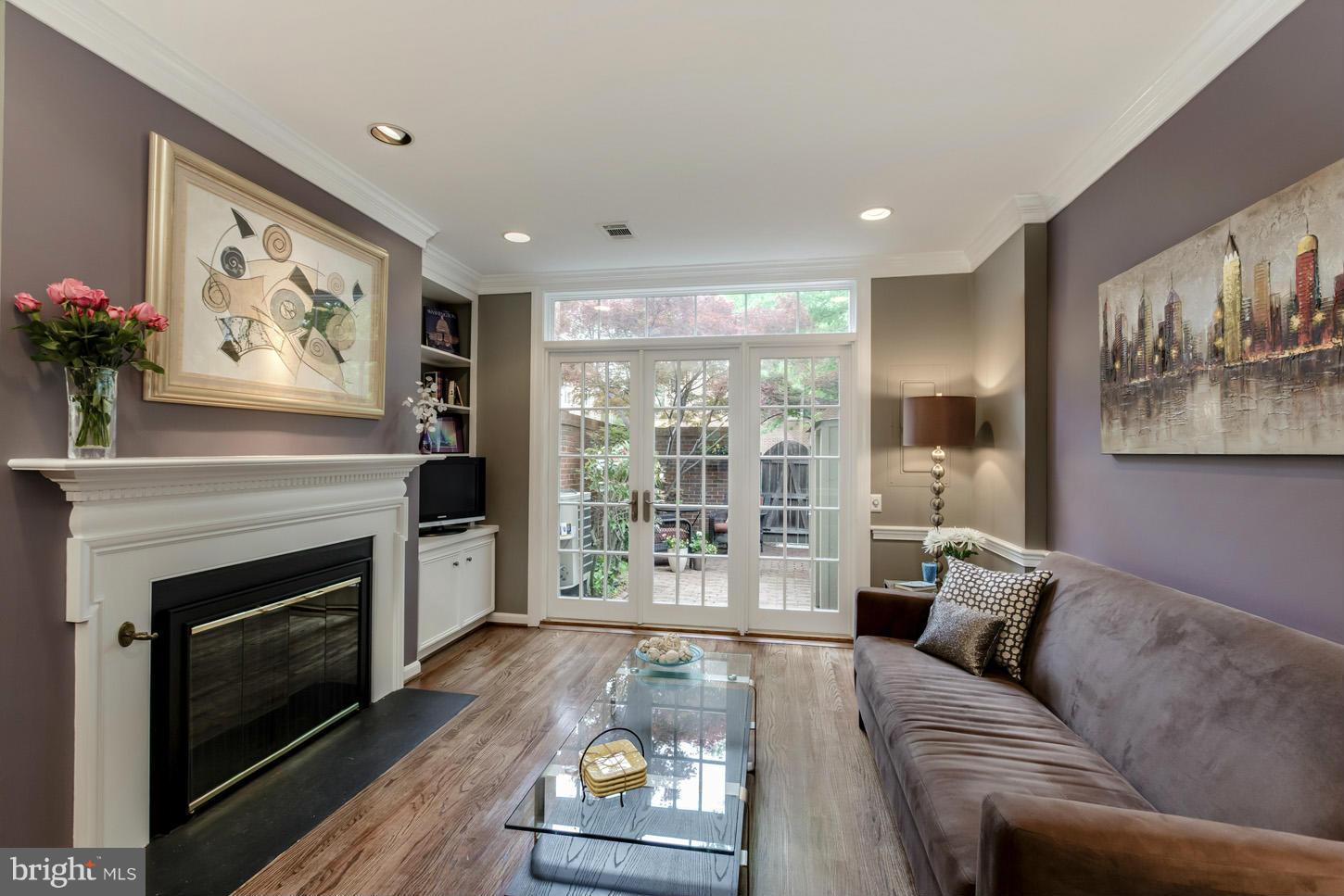 1233 Portner Road Alexandria, VA 22314 - Photo 1 of 29 a living room with furniture and a fireplace