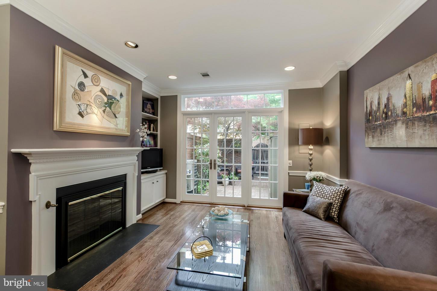 1233 Portner Road Alexandria, VA 22314 - Photo 13 of 29 a living room with furniture and a fireplace