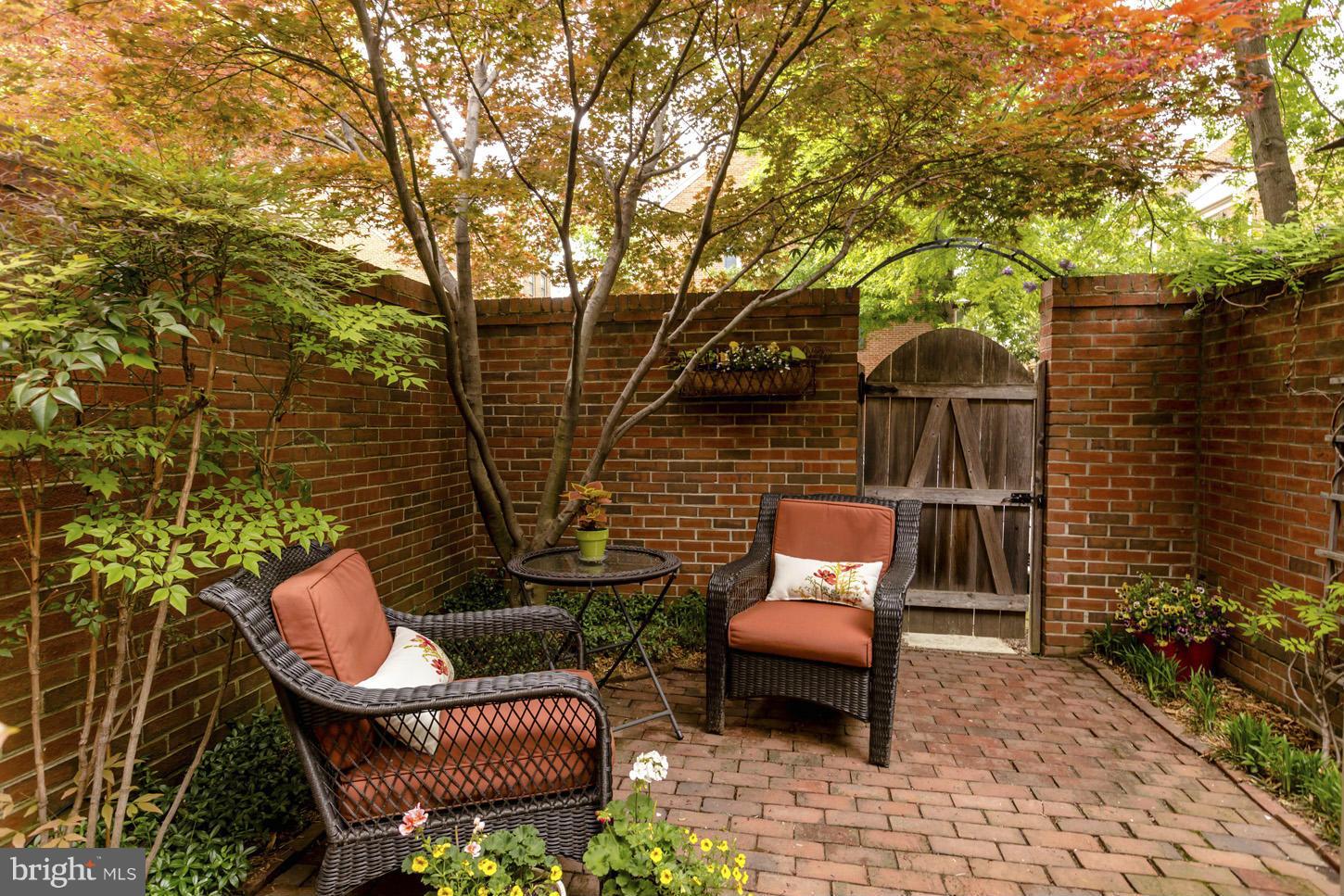 1233 Portner Road Alexandria, VA 22314 - Photo 14 of 29 a view of a chairs and table in backyard