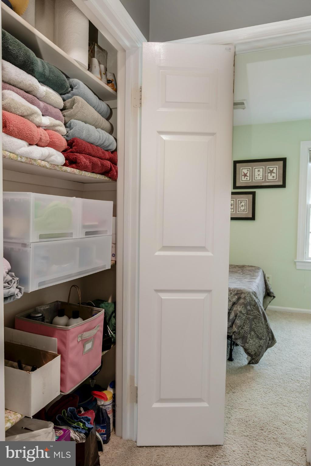 1233 Portner Road Alexandria, VA 22314 - Photo 27 of 29 a view of a bedroom with a bed and closet