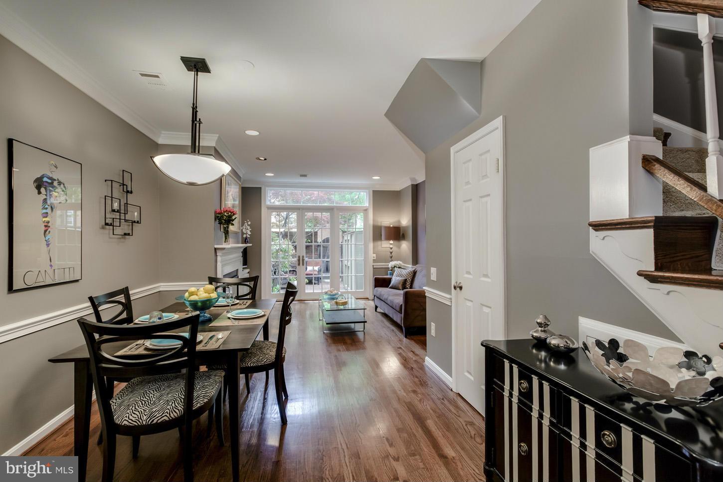 1233 Portner Road Alexandria, VA 22314 - Photo 7 of 29 a view of a dining room with furniture window and wooden floor
