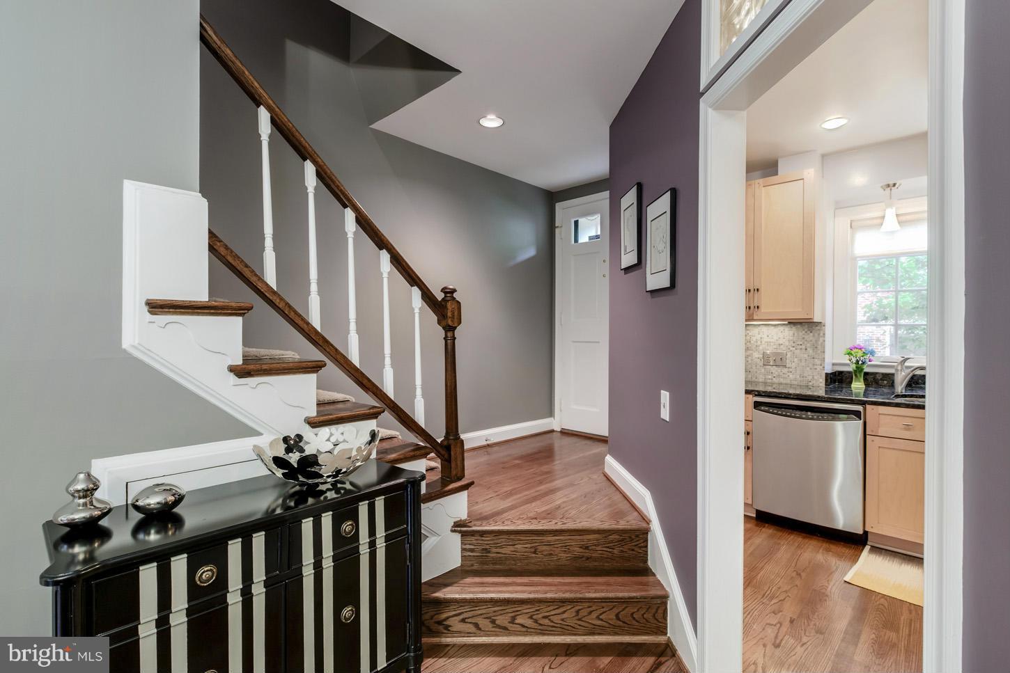 1233 Portner Road Alexandria, VA 22314 - Photo 10 of 29 a view of entryway and hall with wooden floor