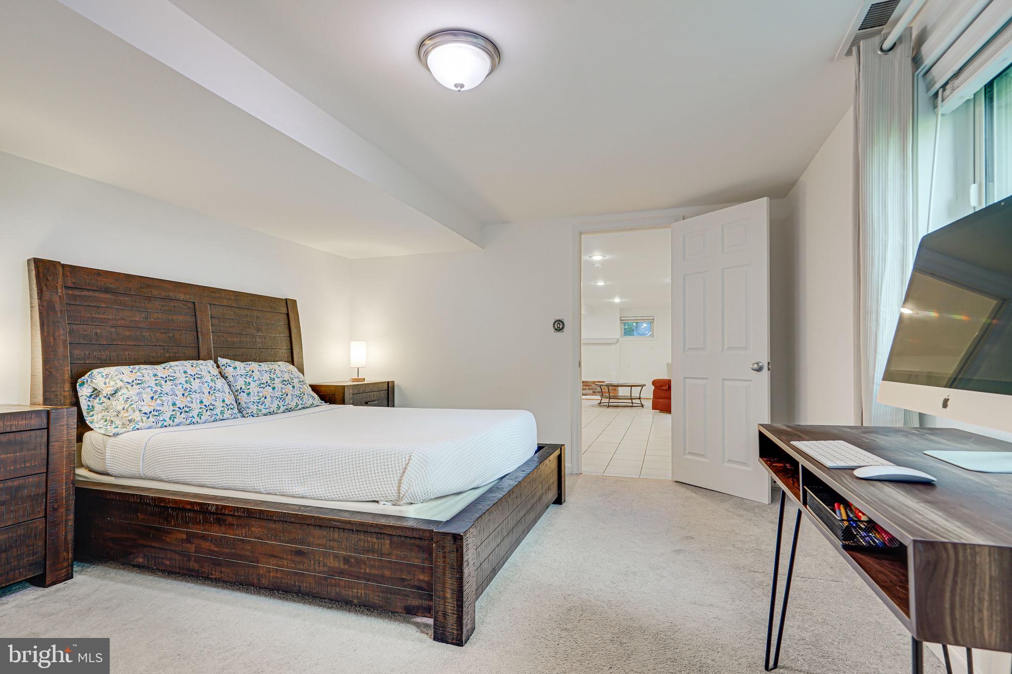 6641 Kerns Road Falls Church, VA 22042 - Photo 26 of 36 Lower Level Bedroom flows to large living space