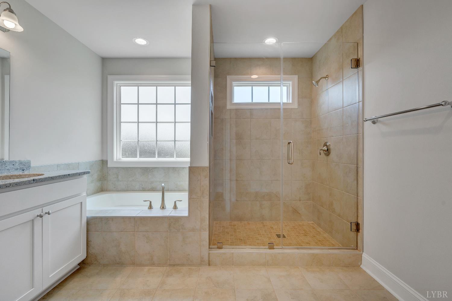 23 Elk Crk Road Forest, VA 24551 - Photo 14 of 22 a bathroom with a bathtub and shower