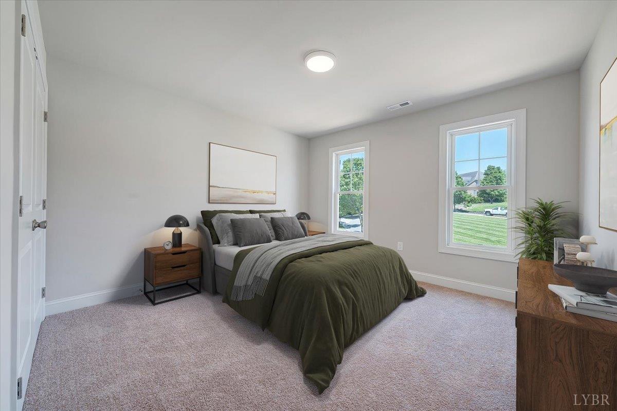23 Elk Crk Road Forest, VA 24551 - Photo 15 of 22 a living room with a bed furniture and a window