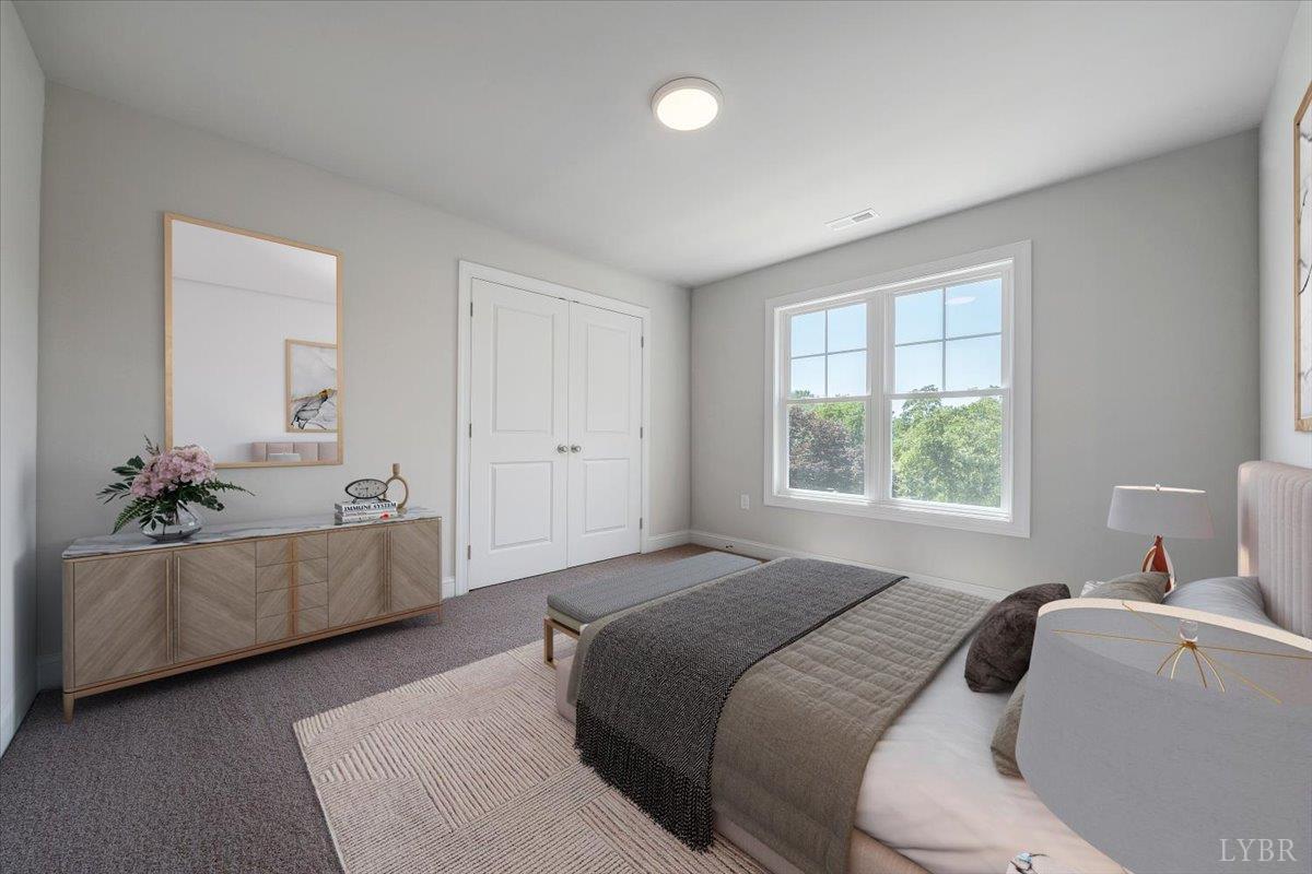 23 Elk Crk Road Forest, VA 24551 - Photo 18 of 22 a bedroom with a bed and a couch