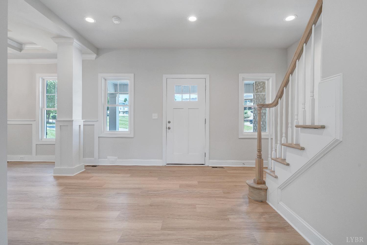 23 Elk Crk Road Forest, VA 24551 - Photo 2 of 22 a view of an empty room with wooden floor and stairs