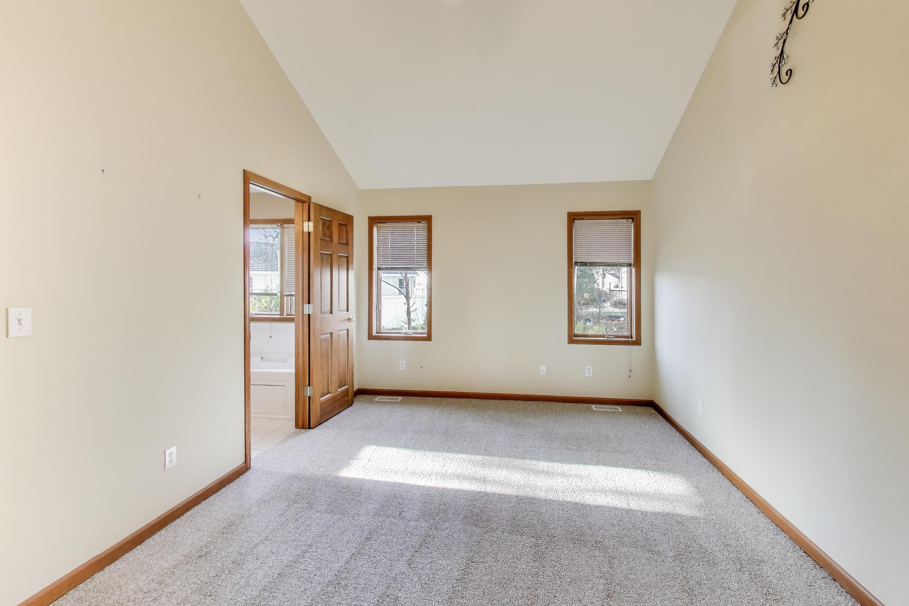 1642 Commodore Lane Chesterton, IN 46304 - Photo 12 of 34 an empty room with windows