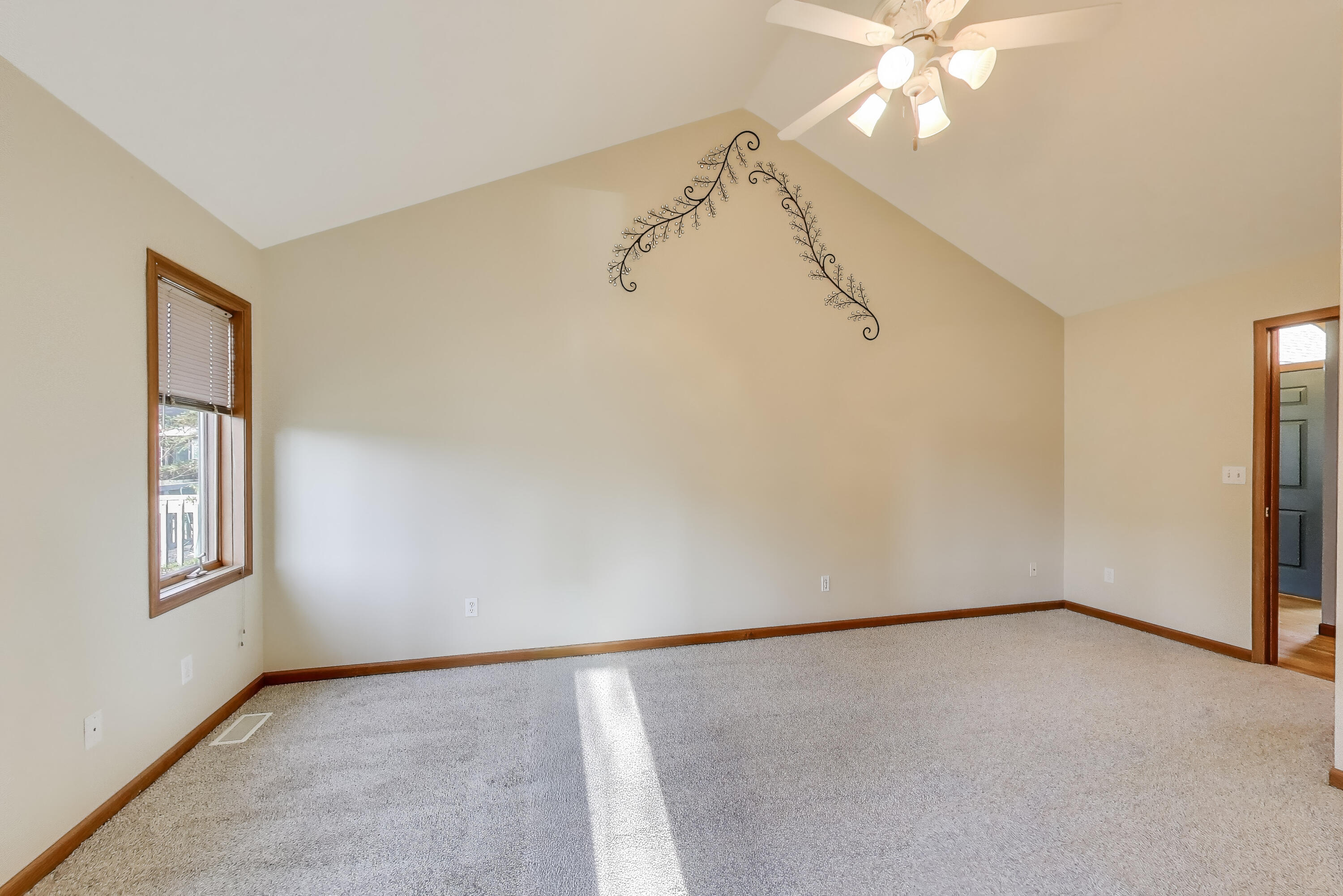 1642 Commodore Lane Chesterton, IN 46304 - Photo 13 of 34 an empty room with windows and fan