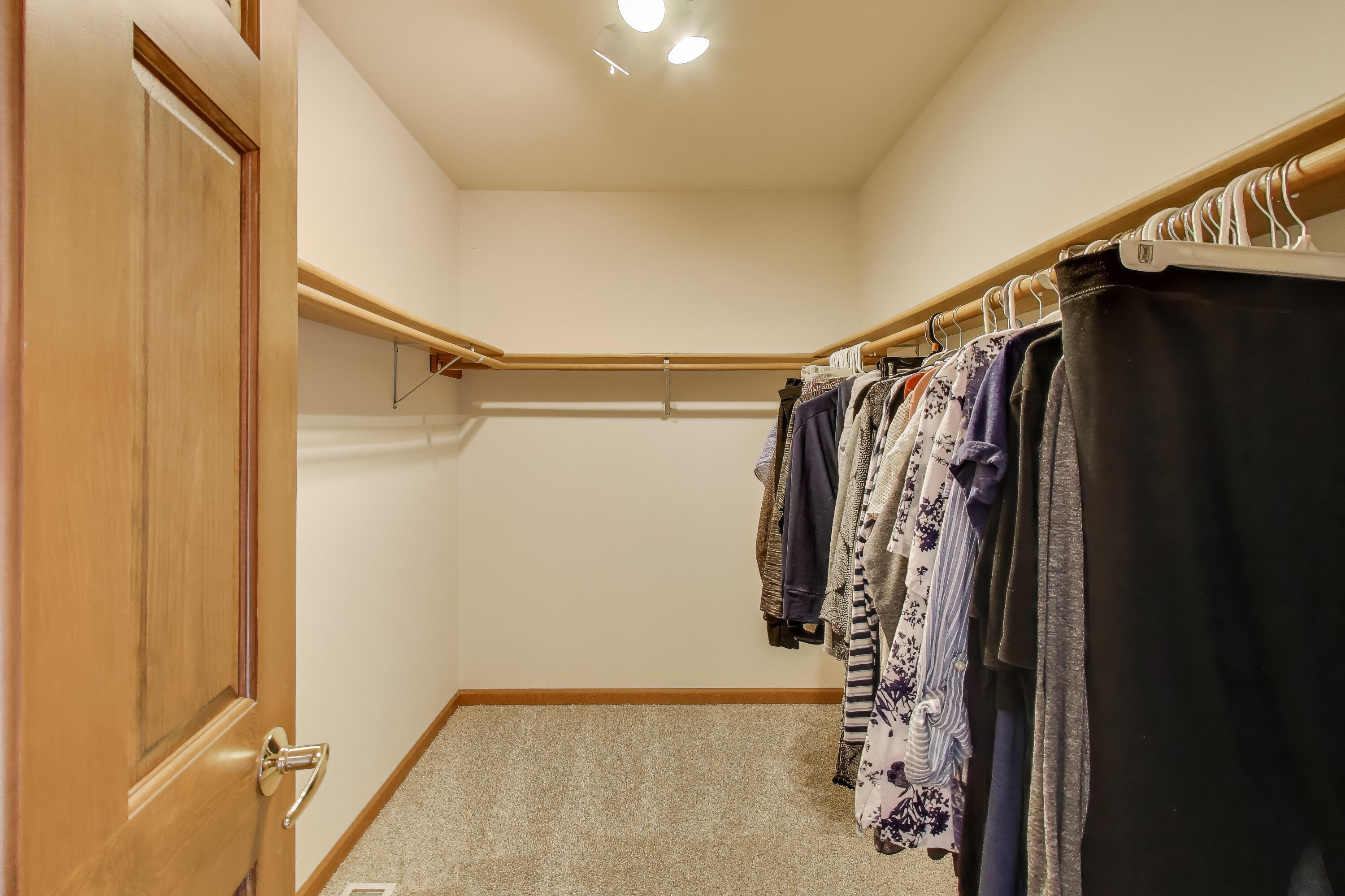 1642 Commodore Lane Chesterton, IN 46304 - Photo 15 of 34 a view of walk in closet with clothes and shoes