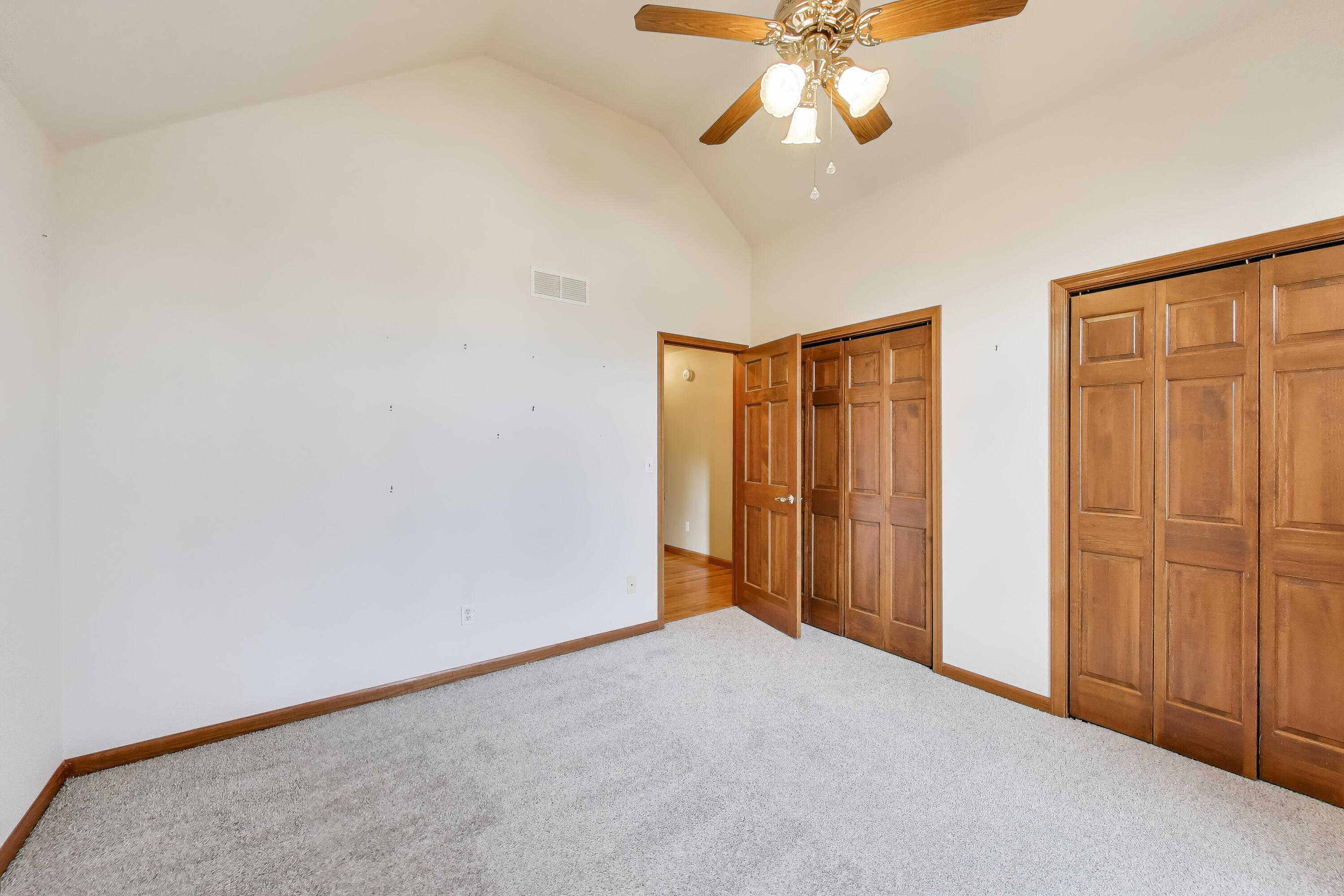 1642 Commodore Lane Chesterton, IN 46304 - Photo 20 of 34 an empty room with chandelier fan