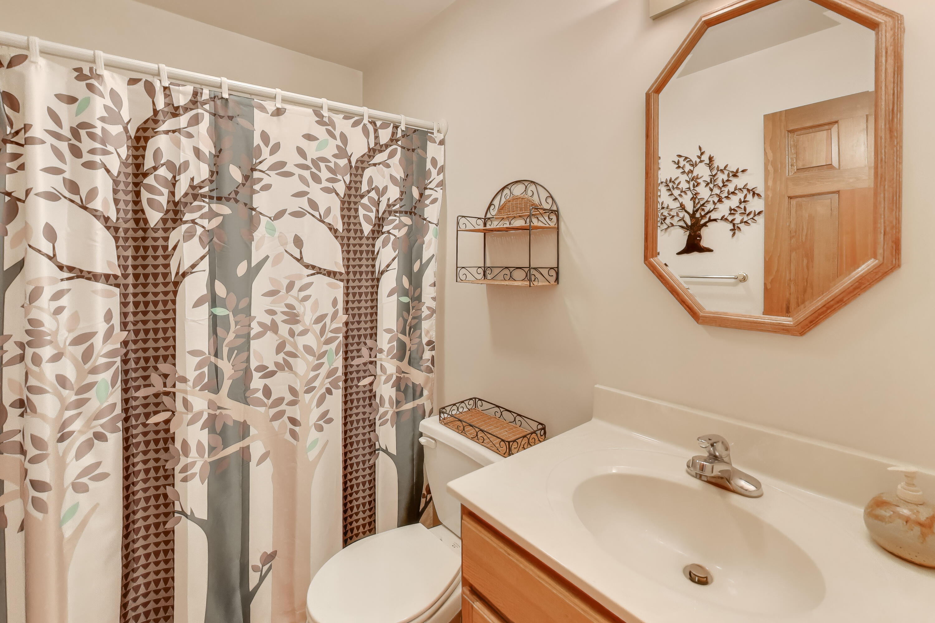 1642 Commodore Lane Chesterton, IN 46304 - Photo 23 of 34 a bathroom with a sink toilet and shower